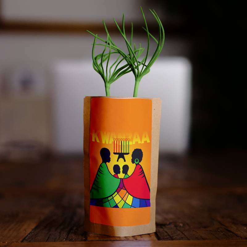 Happy Kwanzaa Candles and People Growing Kit