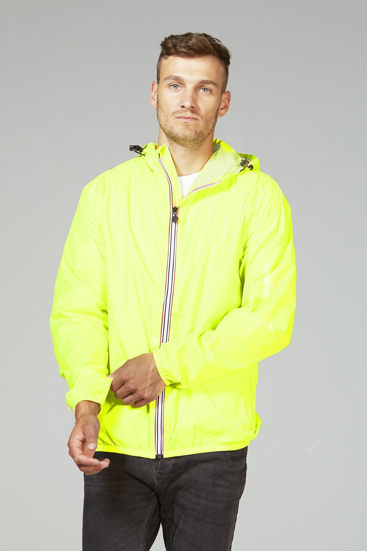 Yellow fluo full zip packable rain jacket and windbreaker